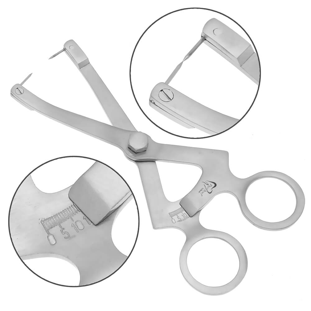 a pair of scissors with a ruler on the handle